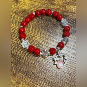 Red Beaded Bracelet with Silver Charm
